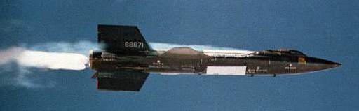 X-15 #2 launches away from the B-52 mothership with its rocket engine ignited